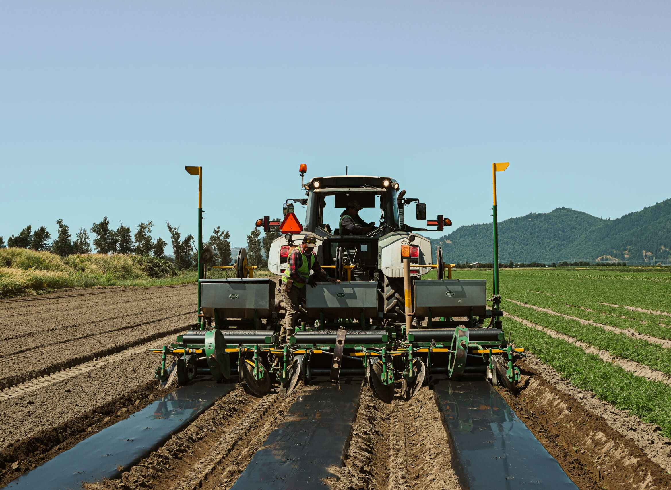 BumiGro biodegradable mulch film being installed on agricultural fields to improve soil health, support sustainable farming, and eliminate microplastic waste.